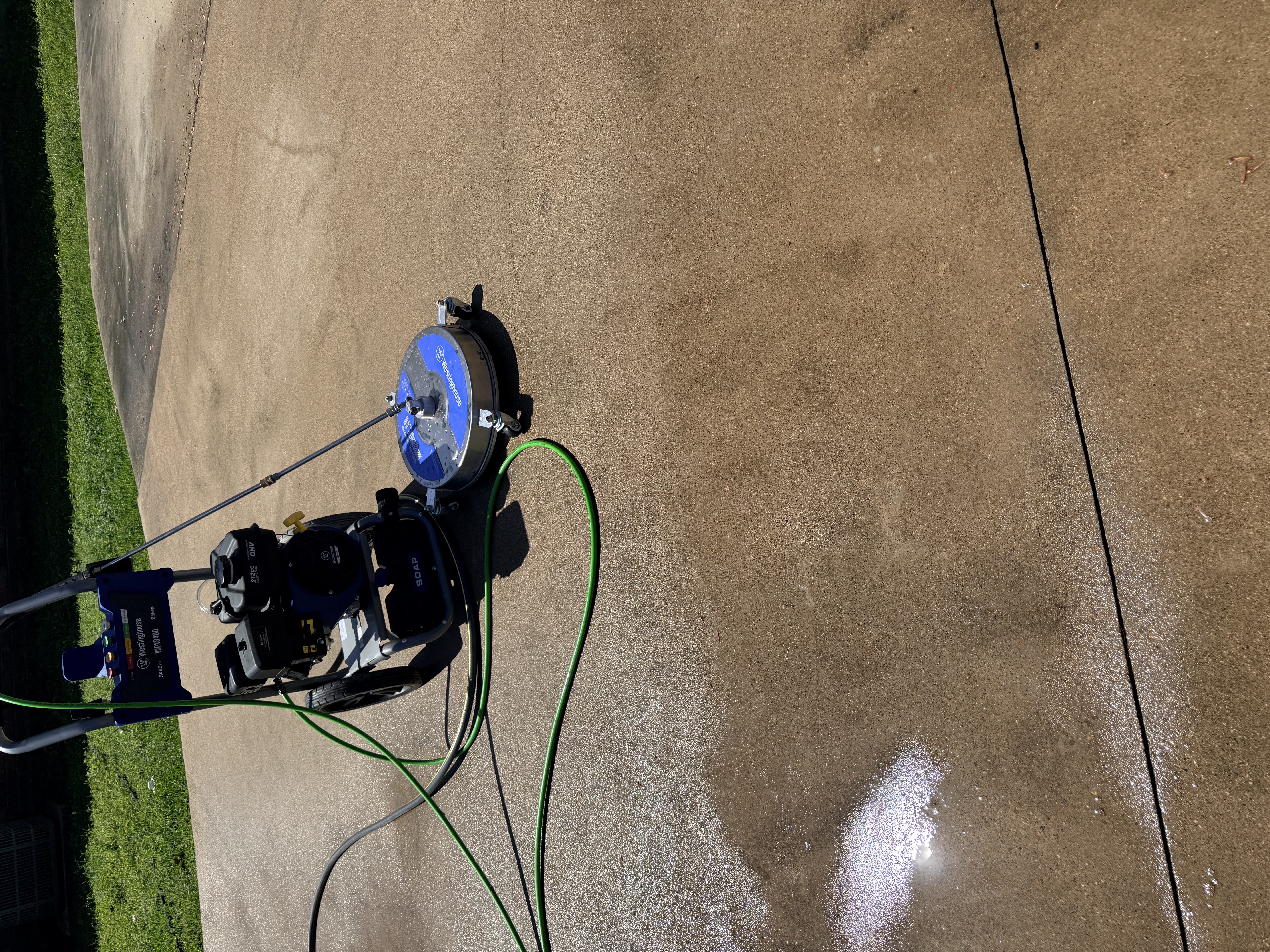 Clean driveway after pressure washing